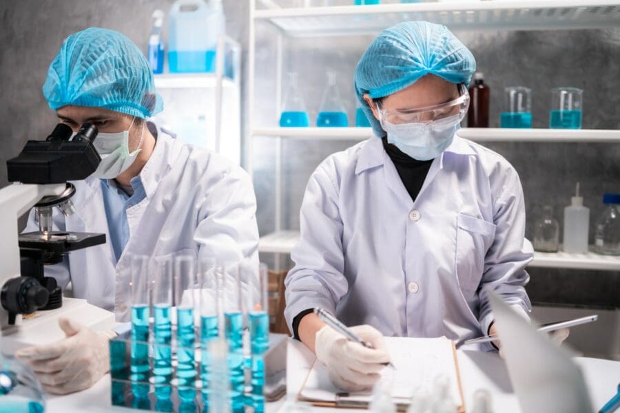 Health care researchers working in life science laboratory, medical science technology research China is now the most cited country in research